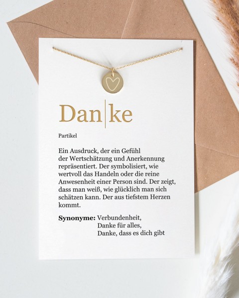 Dankeschön-Geschenk - Halskette mit eingraviertem Herz und einer Karte mit der Definition von "Danke"